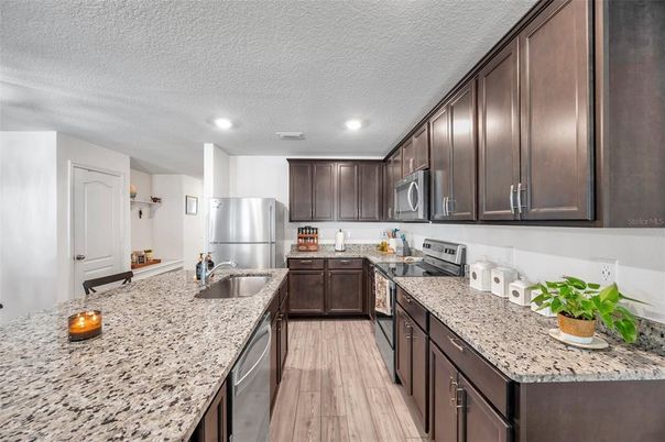 Interior, Kitchen, Recessed Lighting, Stainless Steel Appliances, Wood Texture Flooring