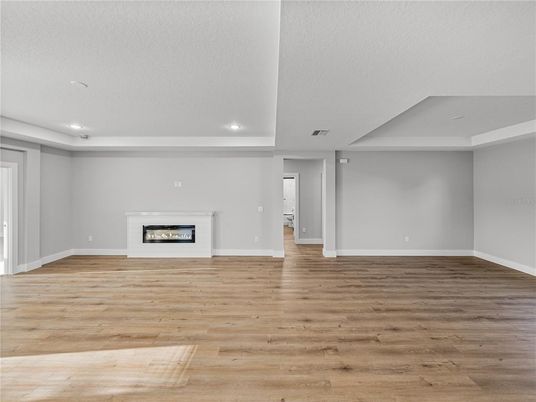 Empty room, Fireplace, Interior, Recessed Lighting, Wood Texture Flooring