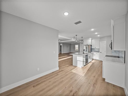 Interior, Kitchen, Pendant Lights, Recessed Lighting, Stainless Steel Appliances, Wood Texture Flooring