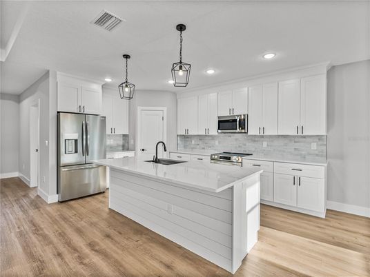 Interior, Kitchen, Pendant Lights, Recessed Lighting, Stainless Steel Appliances, Wood Texture Flooring