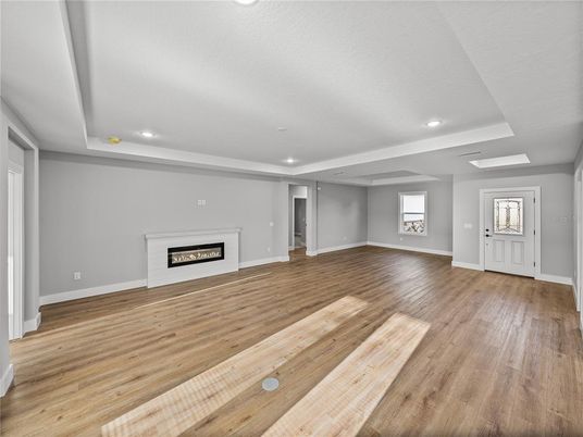 Empty room, Fireplace, Interior, Recessed Lighting, Wood Texture Flooring