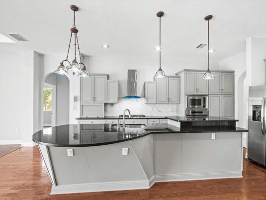 Interior, Kitchen, Pendant Lights, Recessed Lighting, Stainless Steel Appliances, Wood Texture Flooring