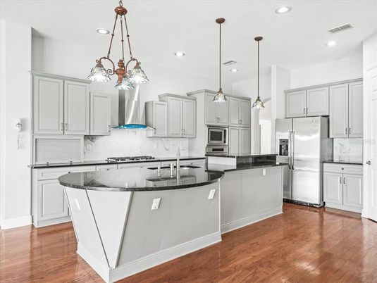 Interior, Kitchen, Pendant Lights, Recessed Lighting, Stainless Steel Appliances, Wood Texture Flooring