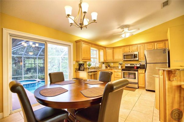 Chandelier, Dining room, Interior, Kitchen, Stainless Steel Appliances
