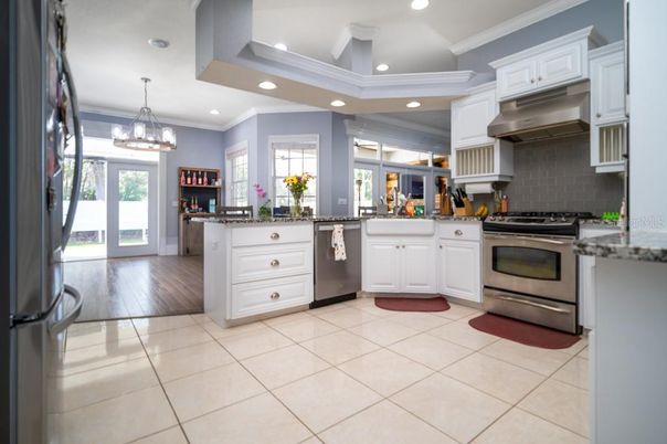 Chandelier, Interior, Kitchen, Recessed Lighting, Stainless Steel Appliances, Wood Texture Flooring