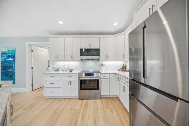Interior, Kitchen, Recessed Lighting, Stainless Steel Appliances, Wood Texture Flooring
