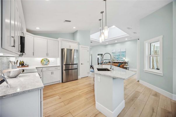 Interior, Kitchen, Pendant Lights, Recessed Lighting, Stainless Steel Appliances, Wood Texture Flooring