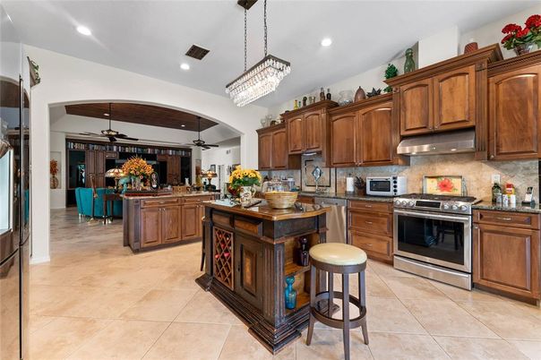 Chandelier, Dining room, Interior, Kitchen, Pendant Lights, Recessed Lighting, Stainless Steel Appliances