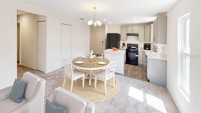 Chandelier, Dining room, Interior, Kitchen, Recessed Lighting, Stainless Steel Appliances, Wood Texture Flooring