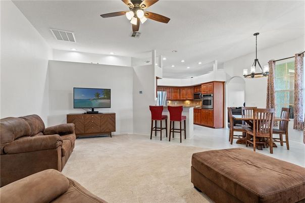 Chandelier, Dining room, Interior, Kitchen, Living room, Pendant Lights, Recessed Lighting, Stainless Steel Appliances