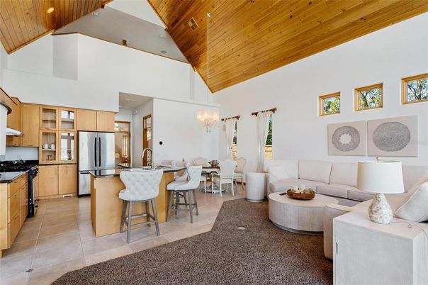 Chandelier, Dining room, Interior, Kitchen, Living room, Recessed Lighting, Stainless Steel Appliances, Wooden Ceilings