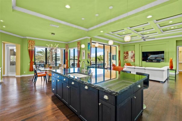 Chandelier, Dining room, Interior, Kitchen, Living room, Pendant Lights, Recessed Lighting, Wood Texture Flooring