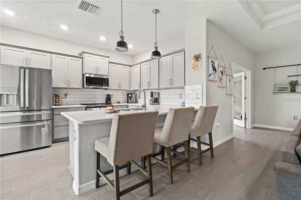Interior, Kitchen, Pendant Lights, Recessed Lighting, Stainless Steel Appliances, Wood Texture Flooring