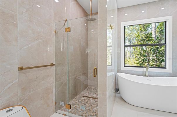 Bathroom, Free Standing Baths, Glass Shower, Interior, Marble Walls, Recessed Lighting