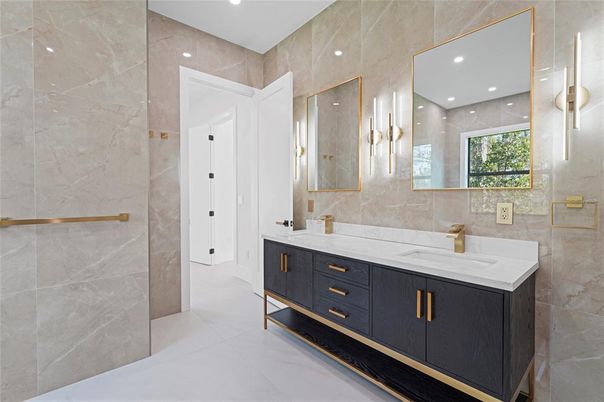 Bathroom, Dual Sink Vanities, Interior, Marble Walls, Recessed Lighting