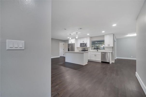 Interior, Kitchen, Pendant Lights, Recessed Lighting, Stainless Steel Appliances, Wood Texture Flooring