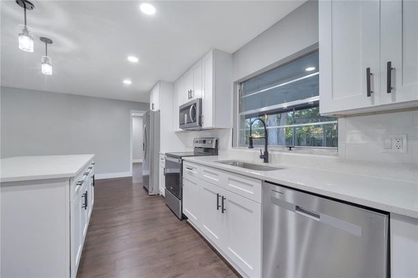 Interior, Kitchen, Pendant Lights, Recessed Lighting, Stainless Steel Appliances, Wood Texture Flooring
