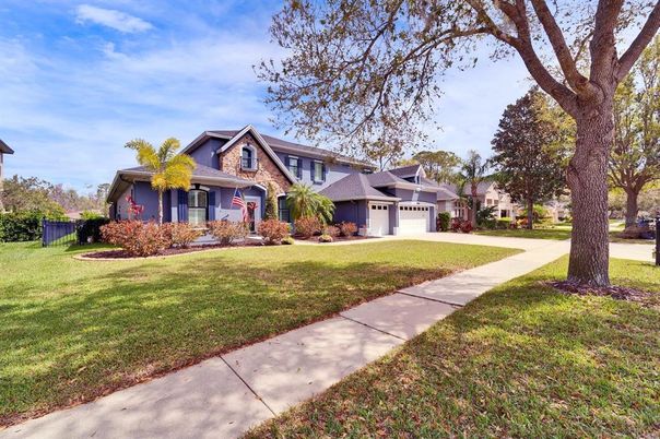Attached, Backyard, Exterior, Facade, Brick Facade, Split Level