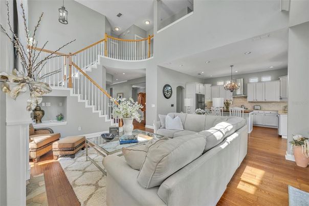 Chandelier, Dining room, Interior, Kitchen, Living room, Recessed Lighting, Wood Texture Flooring
