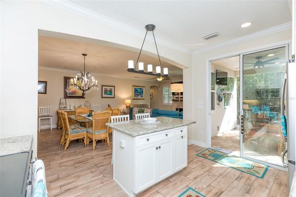 Chandelier, Dining room, Interior, Pendant Lights, Recessed Lighting, Wood Texture Flooring