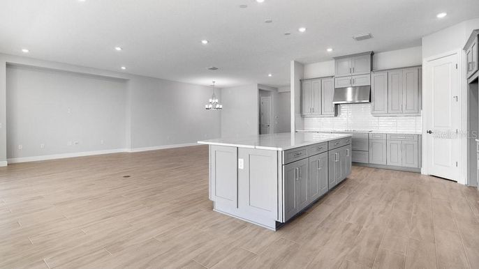 Chandelier, Interior, Kitchen, Recessed Lighting, Stainless Steel Appliances, Wood Texture Flooring