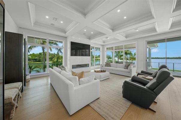 Fireplace, Interior, Living room, Recessed Lighting, Water, Wood Texture Flooring
