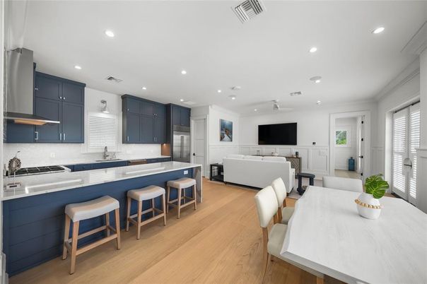 Dining room, Interior, Kitchen, Living room, Recessed Lighting, Stainless Steel Appliances, Wood Texture Flooring