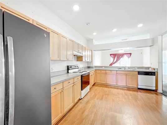 Interior, Kitchen, Recessed Lighting, Stainless Steel Appliances, Wood Texture Flooring