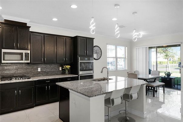 Dining room, Interior, Kitchen, Marble, Pendant Lights, Recessed Lighting, Stainless Steel Appliances