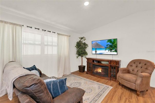 Fireplace, Interior, Recessed Lighting, Wood Texture Flooring