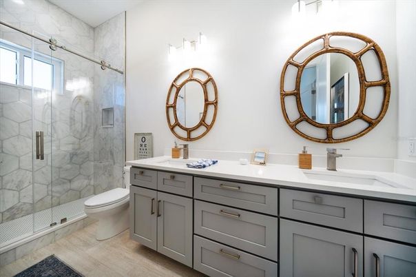 Bathroom, Dual Sink Vanities, Glass Shower, Interior, Marble Walls