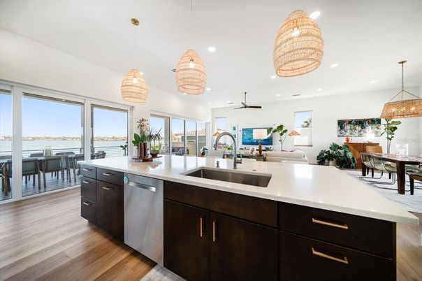Dining room, Interior, Kitchen, Pendant Lights, Recessed Lighting, Stainless Steel Appliances, Wood Texture Flooring