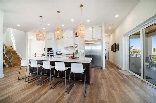 Interior, Kitchen, Pendant Lights, Recessed Lighting, Stainless Steel Appliances, Wood Texture Flooring