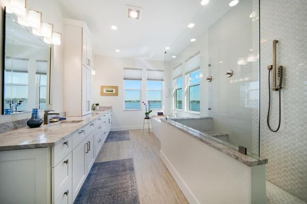 Bathroom, Dual Sink Vanities, Glass Shower, Interior, Recessed Lighting, Wood Texture Flooring