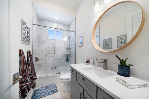 Bathroom, Dual Sink Vanities, Interior, Recessed Lighting, Wood Texture Flooring