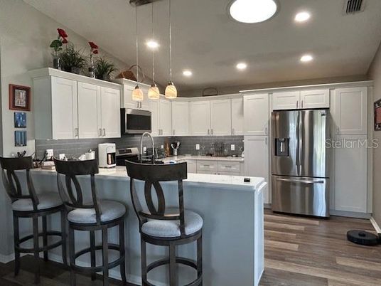 Interior, Kitchen, Pendant Lights, Recessed Lighting, Stainless Steel Appliances, Wood Texture Flooring