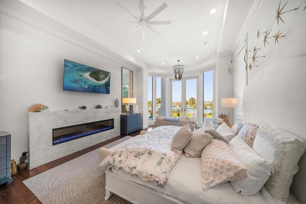 Bedroom, Fireplace, Interior, Living room, Recessed Lighting, Wood Texture Flooring