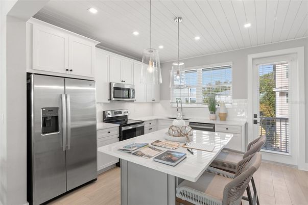 Interior, Kitchen, Pendant Lights, Recessed Lighting, Stainless Steel Appliances, Wood Texture Flooring