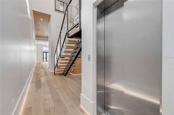 Elevator, Interior, Recessed Lighting, Wood Texture Flooring