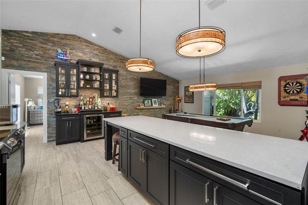 Billiard Table, Game Room, Interior, Kitchen, Pendant Lights, Recessed Lighting, Stone Walls, Wood Texture Flooring