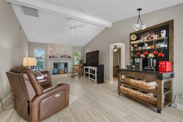Fireplace, Interior, Living room, Pendant Lights, Stone Walls, Wood Texture Flooring