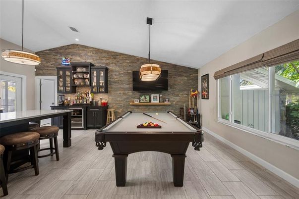 Billiard Table, Game Room, Interior, Pendant Lights, Stone Walls, Wood Texture Flooring