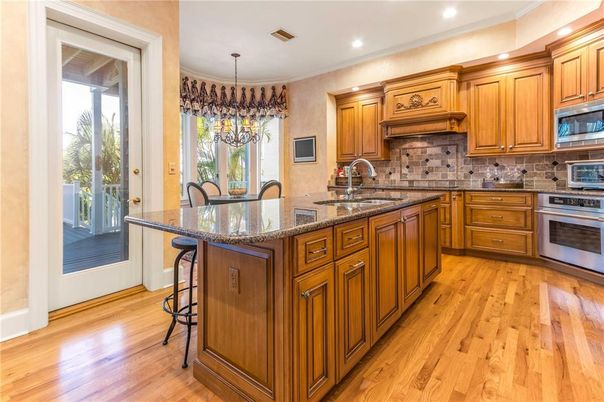 Chandelier, Interior, Kitchen, Recessed Lighting, Stainless Steel Appliances, Wood Texture Flooring