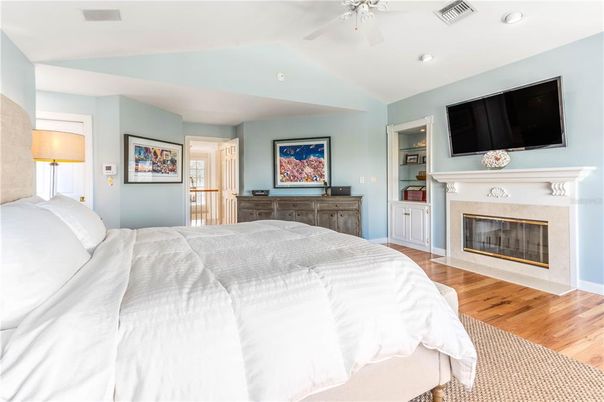 Bedroom, Fireplace, Interior, Recessed Lighting, Wood Texture Flooring