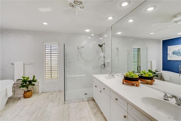 Bathroom, Dual Sink Vanities, Free Standing Baths, Glass Shower, Interior, Marble, Recessed Lighting
