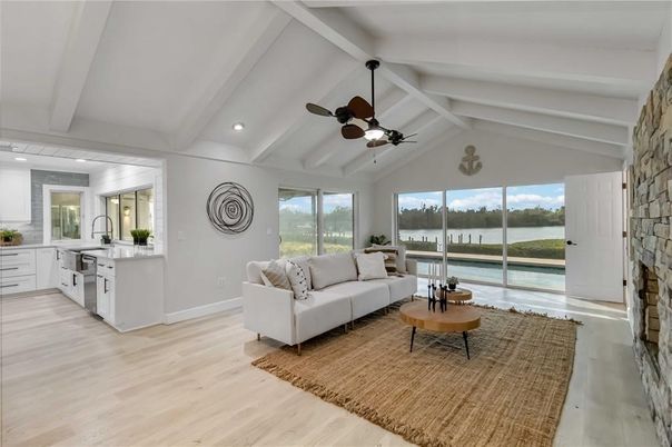 Fireplace, Interior, Kitchen, Living room, Recessed Lighting, Water, Wood Texture Flooring