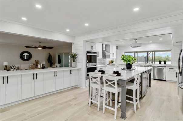 Dining room, Interior, Kitchen, Recessed Lighting, Stainless Steel Appliances, Wood Texture Flooring