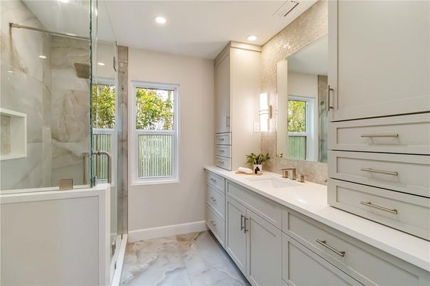 Bathroom, Dual Sink Vanities, Glass Shower, Interior, Marble, Recessed Lighting