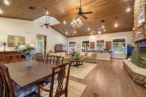 Dining room, Fireplace, Interior, Living room, Pendant Lights, Recessed Lighting, Wooden Ceilings, Wood Texture Flooring