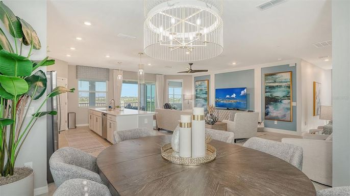Chandelier, Dining room, Interior, Kitchen, Living room, Pendant Lights, Recessed Lighting, Wood Texture Flooring